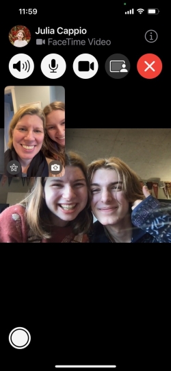 A screenshot of a FaceTime call. Me and my friend are the big picture, my mom and sister are the small picture.