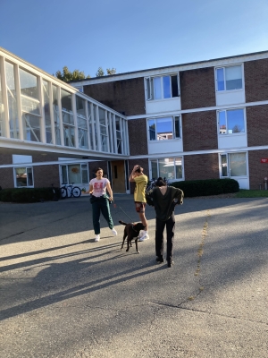 My housemates outside Bissel Hall playing with a dog