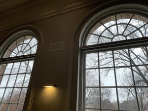 huge windows looking into a grey outdoors