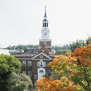 A photo of Baker Tower in the fall, surrounded by trees