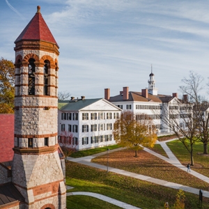 A photo of Dartmouth Hall with the Rollins Chapel tower in the foreground