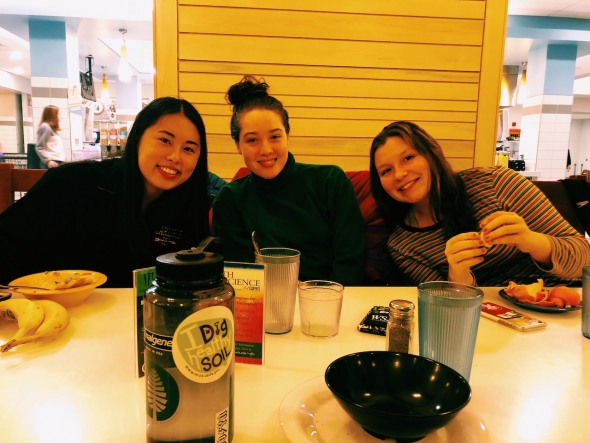 3 of Abbi's teammates eating a post-practice dinner in the Class of 1953 Commons