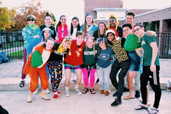 The club swim team outside at a meet dressed in flair!