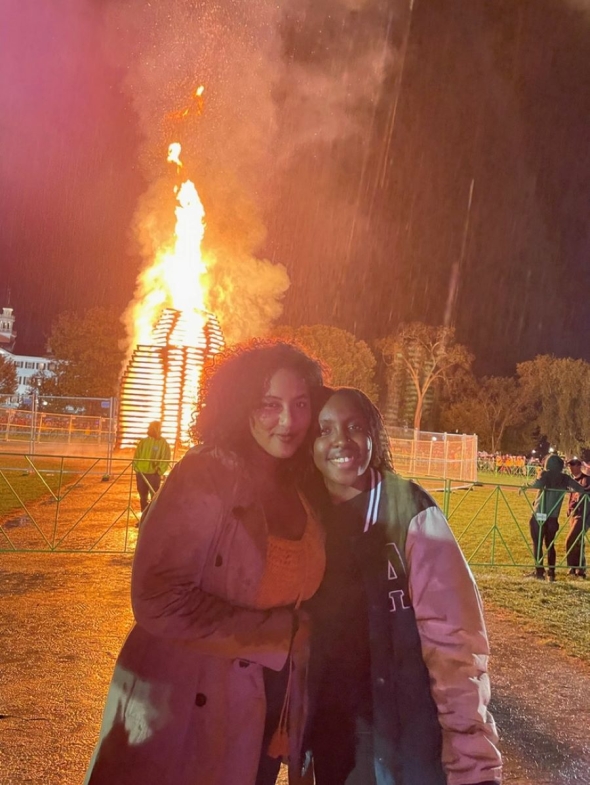 A picture of my friend and I in front of the bonfire! 