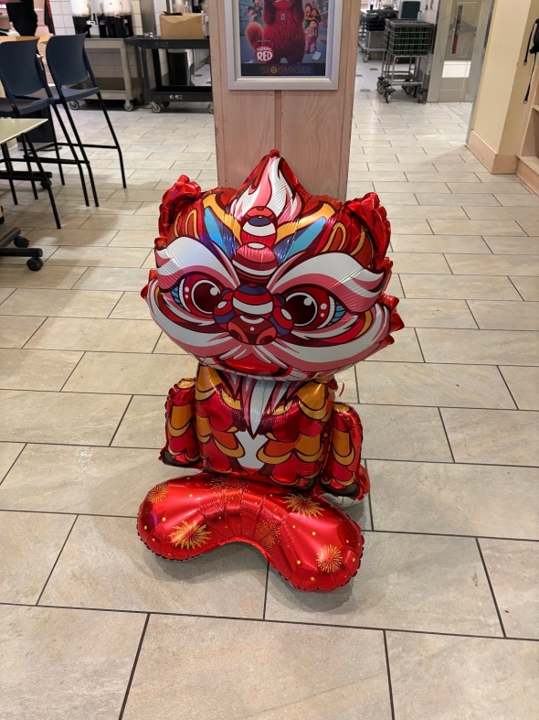 A red dragon balloon.