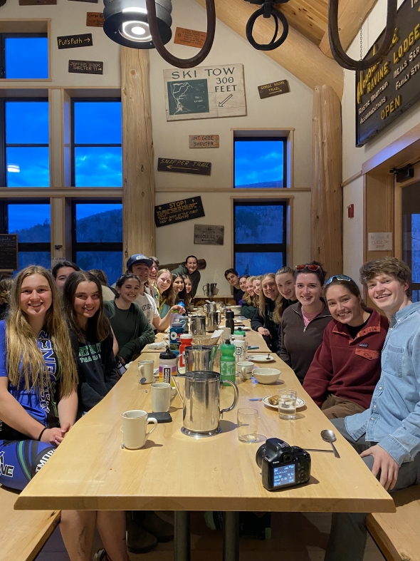 Dartmouth Triathlon Team members at a happy group dinner at Moosilauke Ravine Lodge.