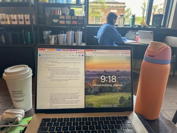 Morning readings on laptop at Starbucks in town 