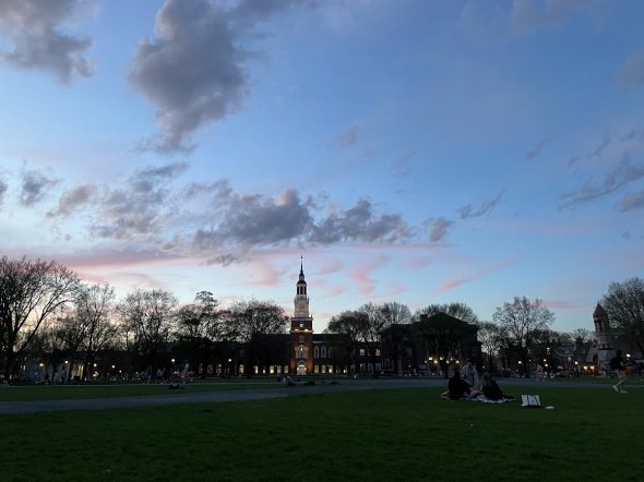 a picture of baker tower against a dark blue sky streaked with pink 