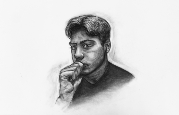 A charcoal self-portrait of the author thinking.