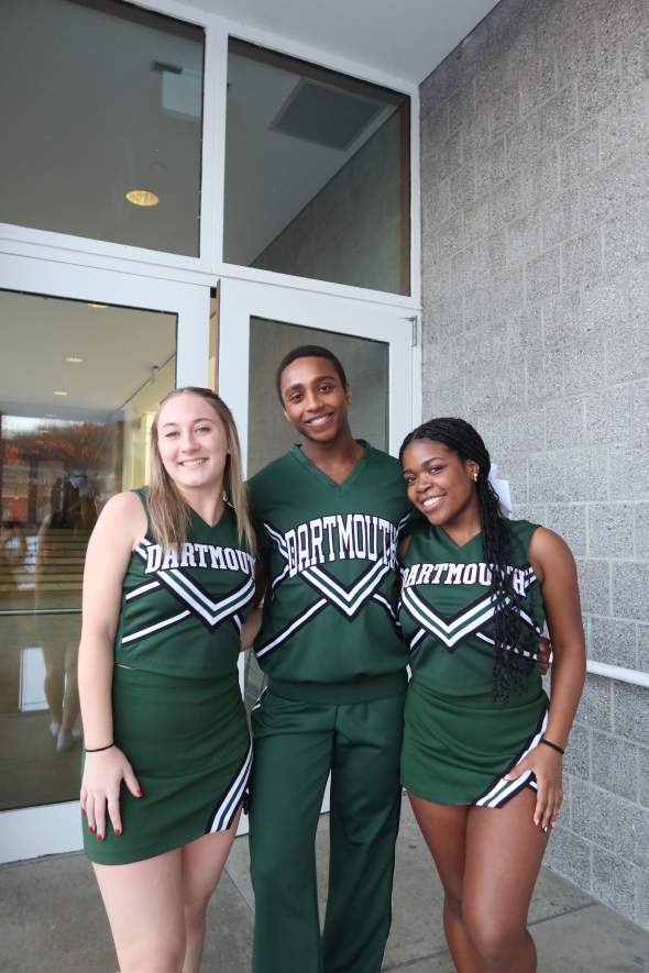 Two of my cheer friends and I posing in our uniforms outside of Leede Arena.