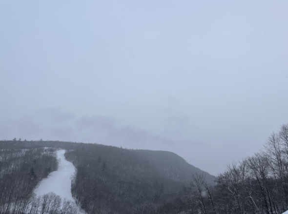 landscape photo of mountains with a cloudy sky.