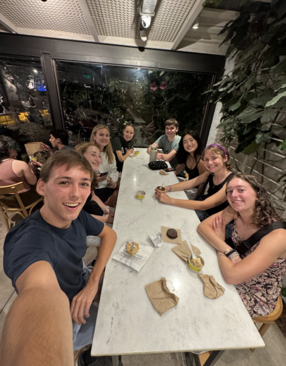 A group selfie of Dartmouth students at a restaurant in Buenos Aires.