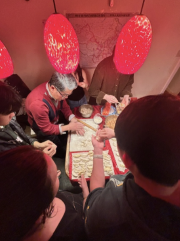 people making dumplings