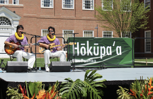 The music being played in front of Baker Library.