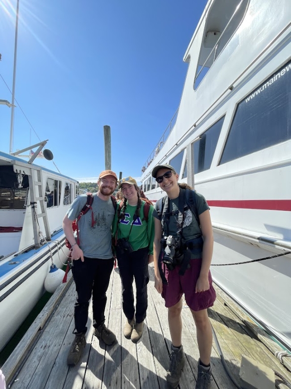 a picture of Wyatt, Kate and Kalina in a harbour in Maine