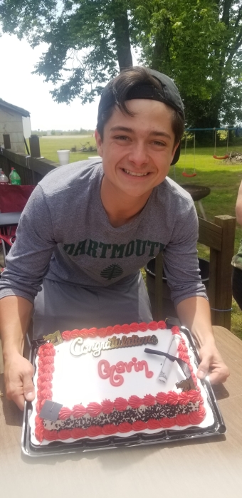 Me with a graduation cake wearing a Dartmouth Shirt