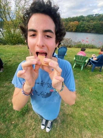 A photo of me eating a smore.